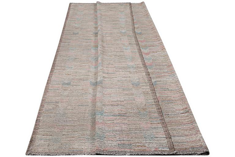 A Moroccan carpet, c. 363 x 284 cm.