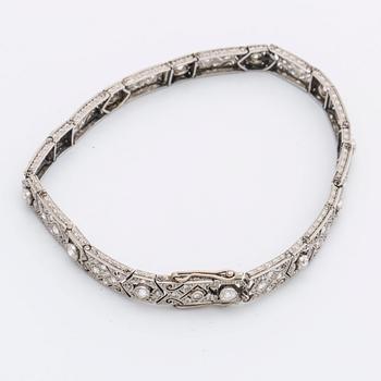 DIAMOND BRACELET, probably platinum, old and rose-cut diamonds approx 2 ct in total, 1 large stone not diamond.
