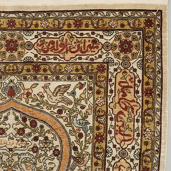 A silk Hereke possibly, around 96 x 66 cm.