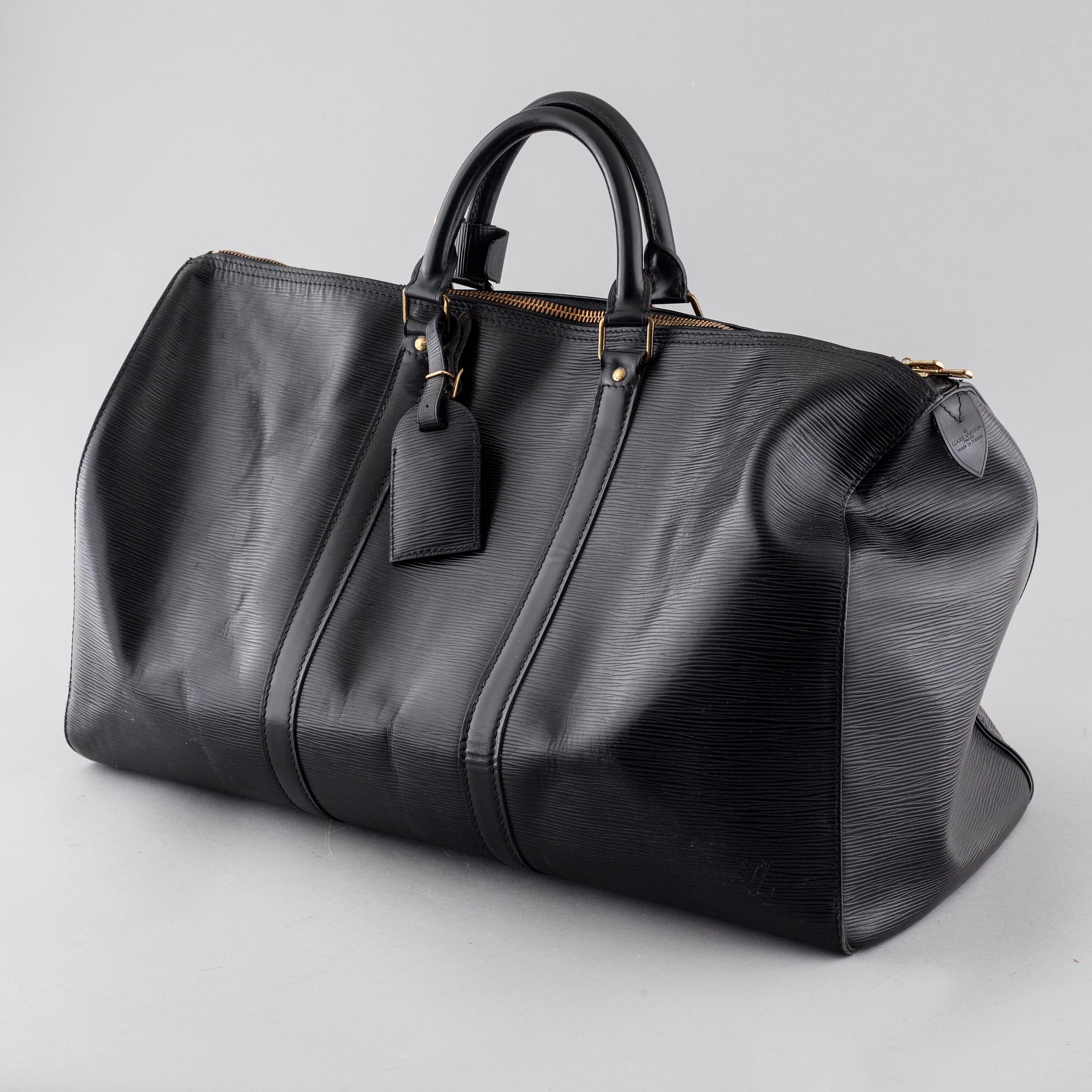 A weekend bag from Louis Vuitton, model "Keepall 50 Epi".