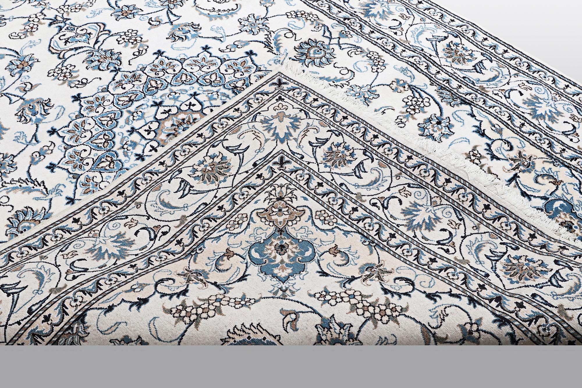 A carpet, Nain, 285 x 196 cm.