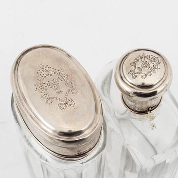 Viktor Lindman, toiletries set, silver and glass, Helsinki 1915-16 (3 pieces).