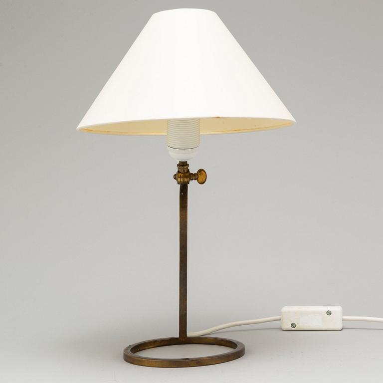 A brass wall/table lamp, mid 20th century.