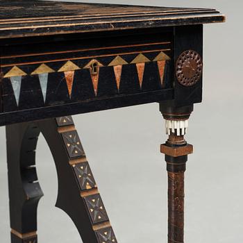 Carlo Bugatti, attributed to, an ebonized wood and walnut desk, Turin, Italy ca 1900.