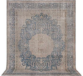 A carpet, Persia, Vintage Kerman design, c. 403 x 301 cm.
