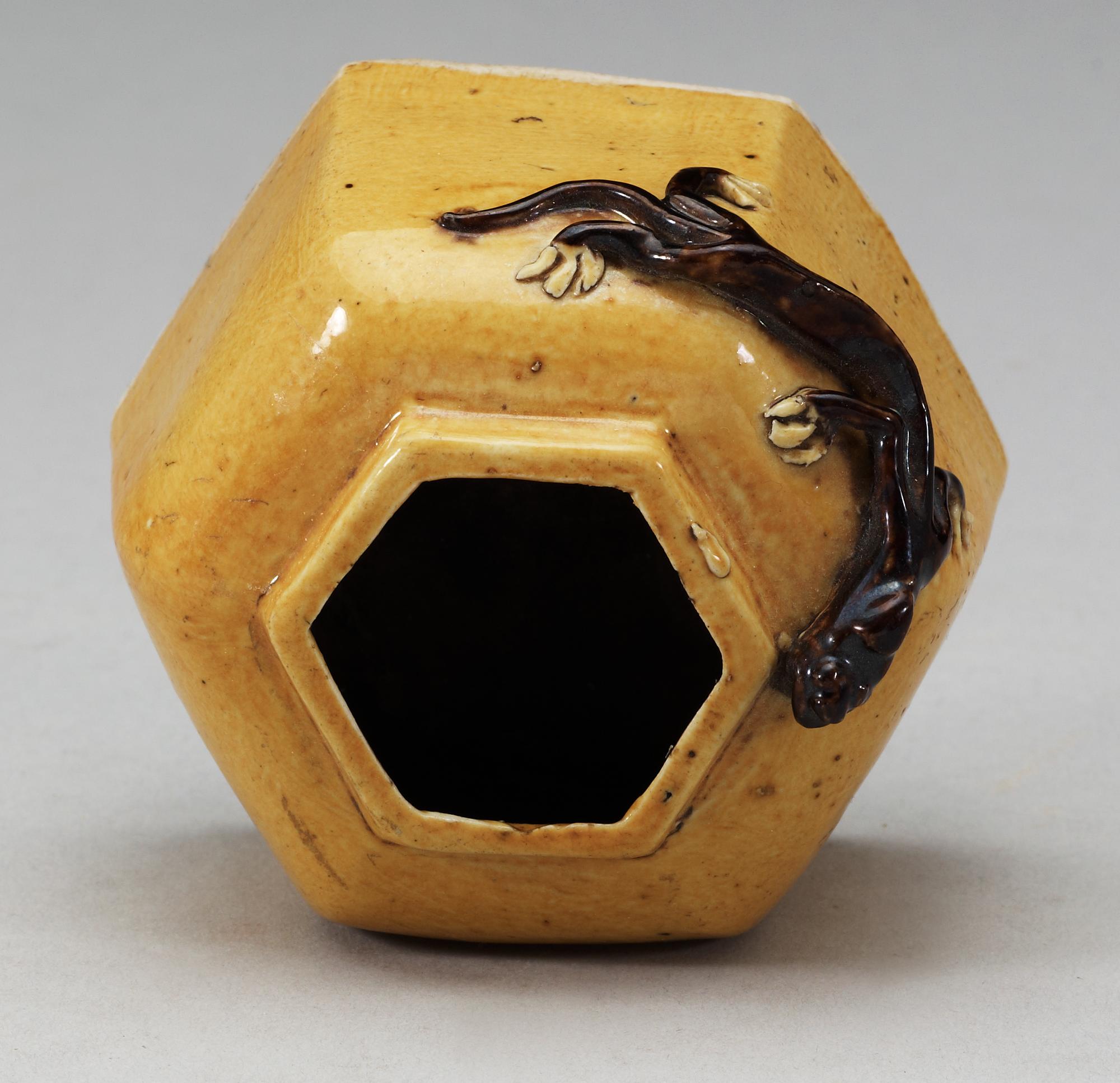 A yellow and brown glazed biscuit brush washer with curling dragon, Kangxi (1664-1722), with Xuande four character mark.