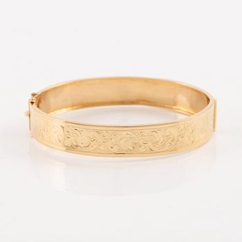 Arm ring 18K gold.