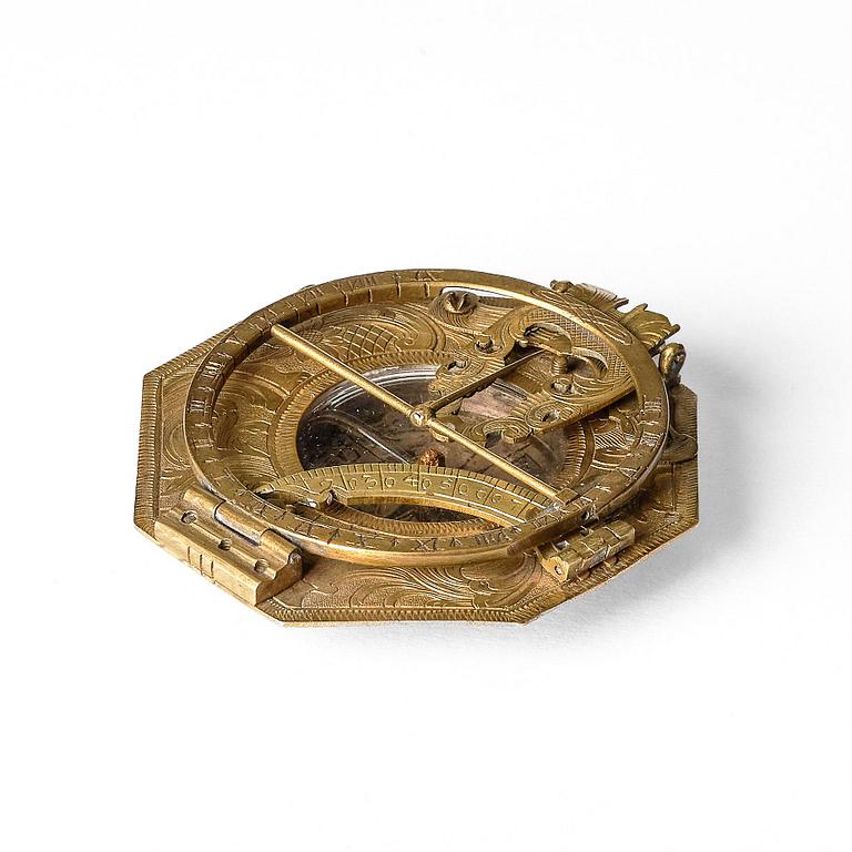An engraved brass octagonal equinoctial compass sundial by Ludwig Theodor Müller (Augsburg, c. 1710-70).