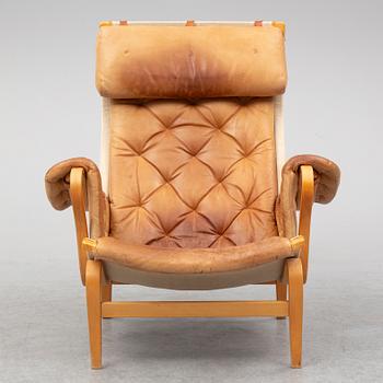 A 'Pernilla' armchair by Bruno Mathsson for dux.