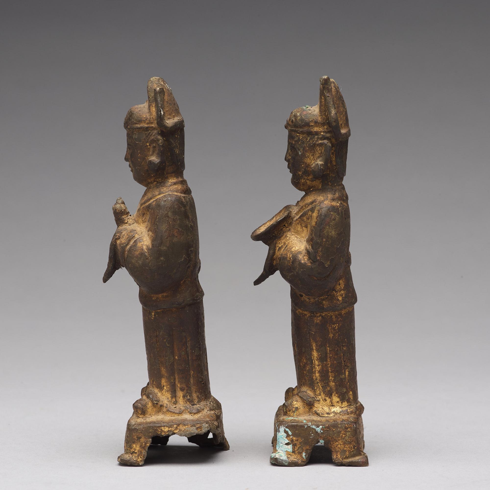 A pair of bronze figurines, Ming dynasty, 17th Century.