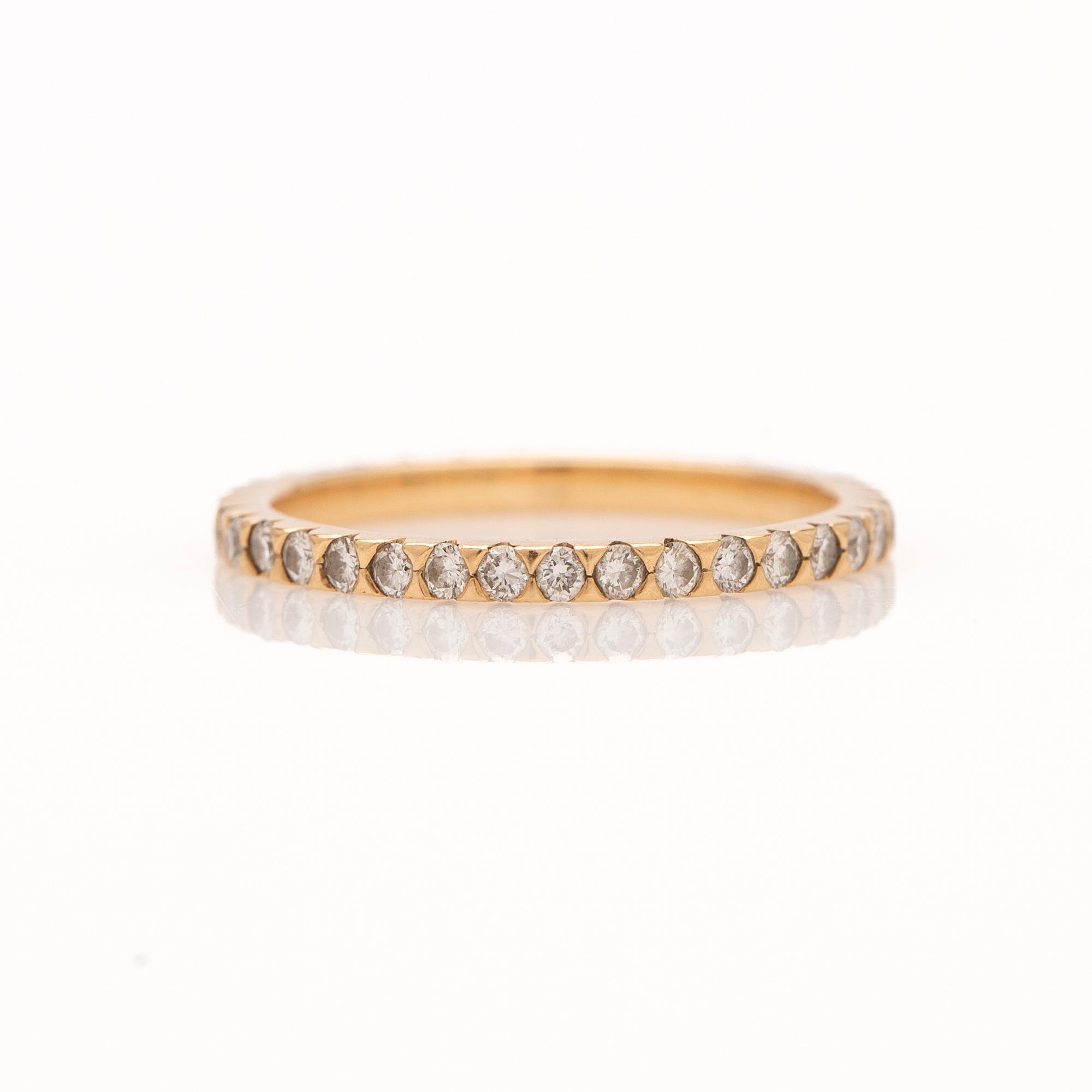 Alliansring, 18k guld med briljantslipade diamanter.