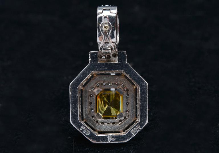 RIIPUS, briljanttihiottuja timantteja n. 1.10 ct H/si. Keltasafiiri n.1.90 ct. Paino12,4 g.