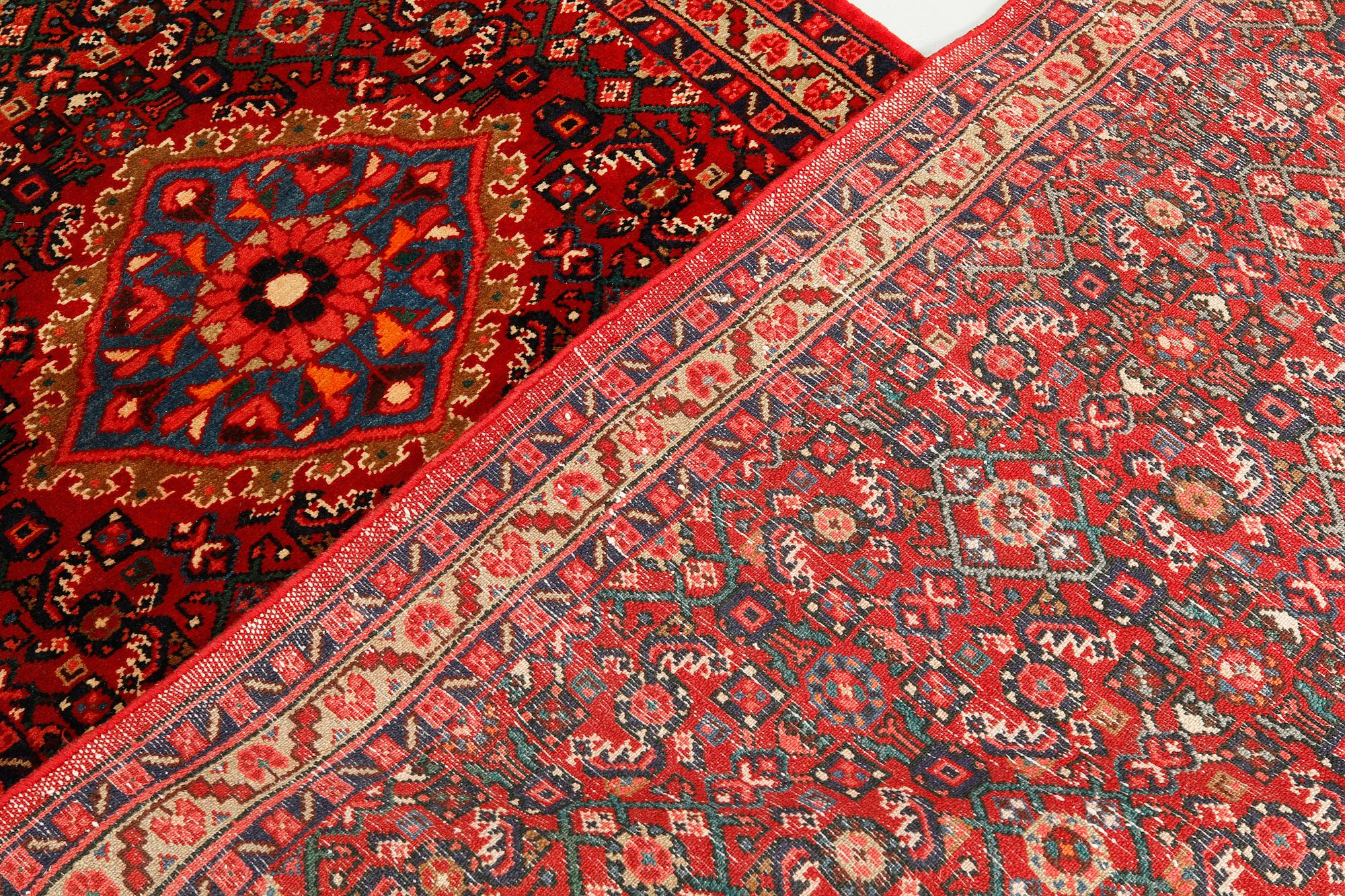 A Hosseinabad runner, ca 427 x 110 cm.