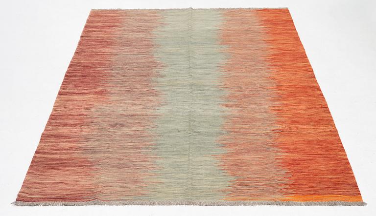 A kilim carpet, 304 x 203 cm.