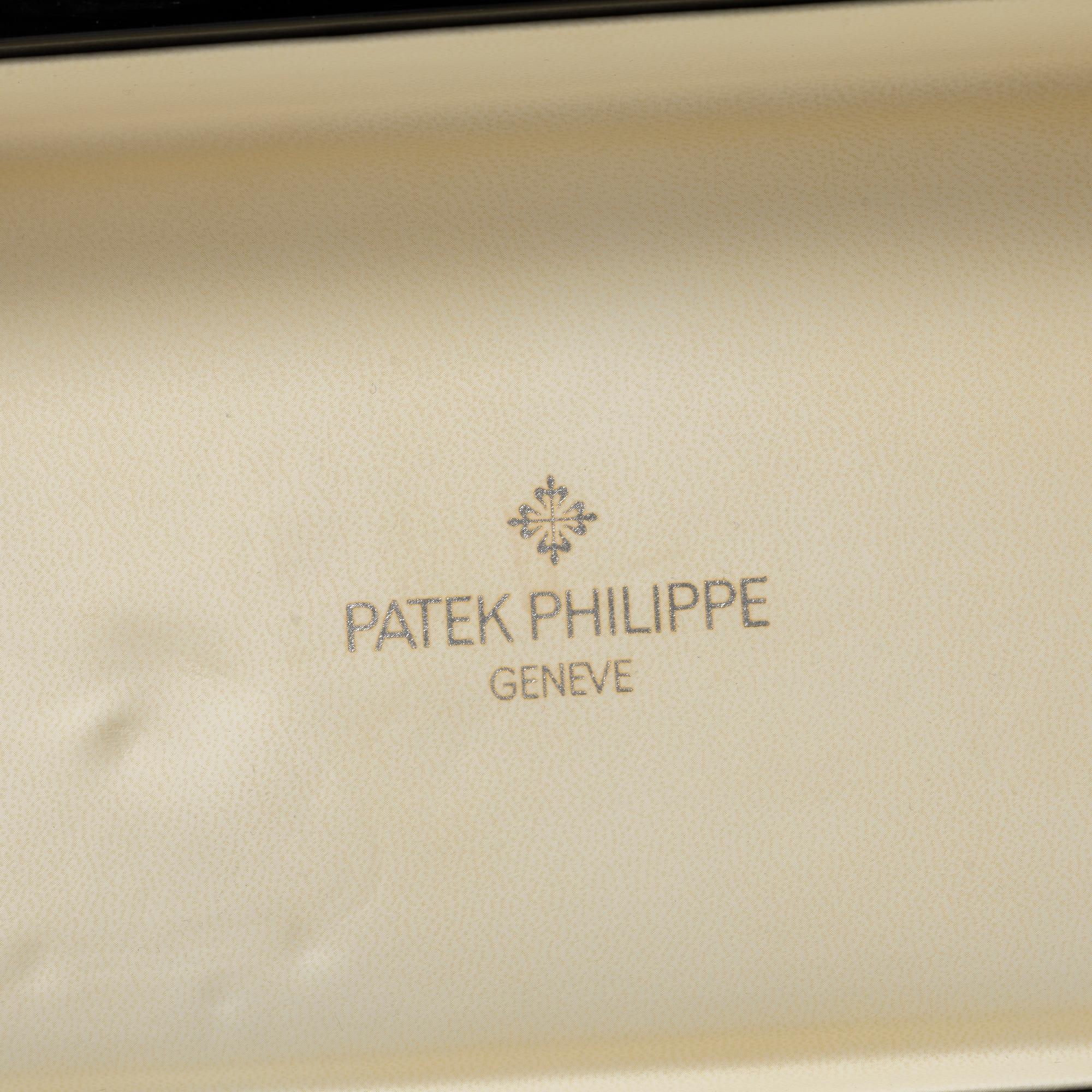 Patek Philippe, box.