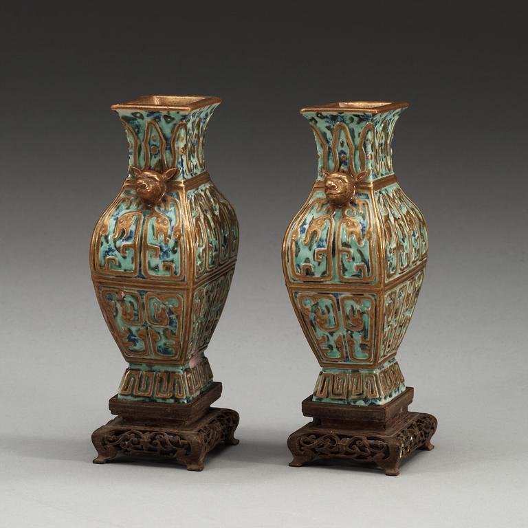 A pair of vases, late Qing dynasty, with Qianlong sealmark.