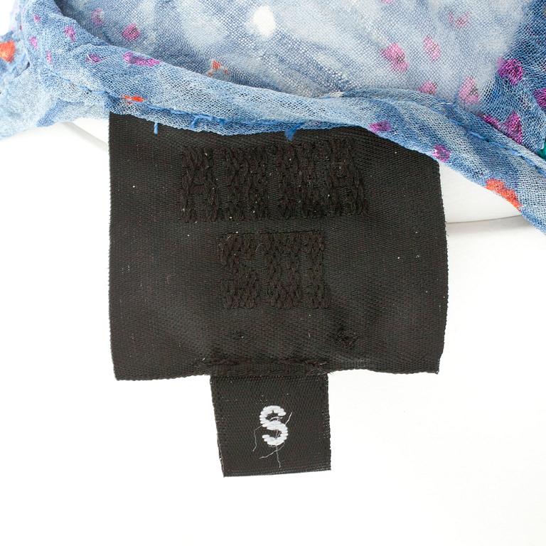 ANNA SUI, a silk chiffong blue and multicolored dress.