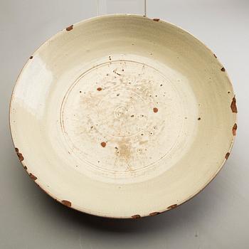 A large cream ware dish, South East Asia, 18th/19th Century.