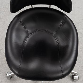 Bruno Mathsson, A "Saga" swivel chair, 21st century.