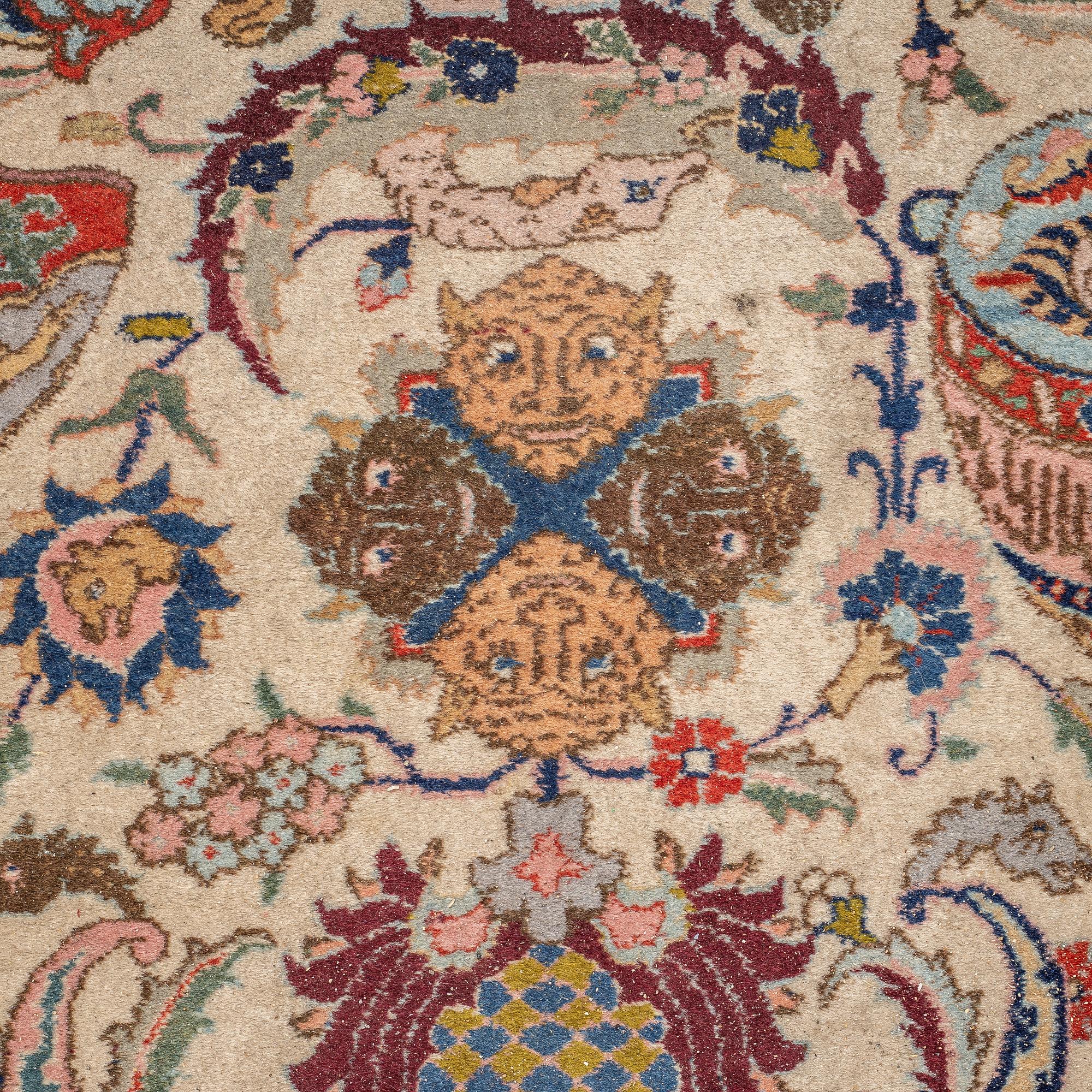 A carpet, a semi-antique Tabriz figural, ca 354,5-362 x 250,5-258 cm.