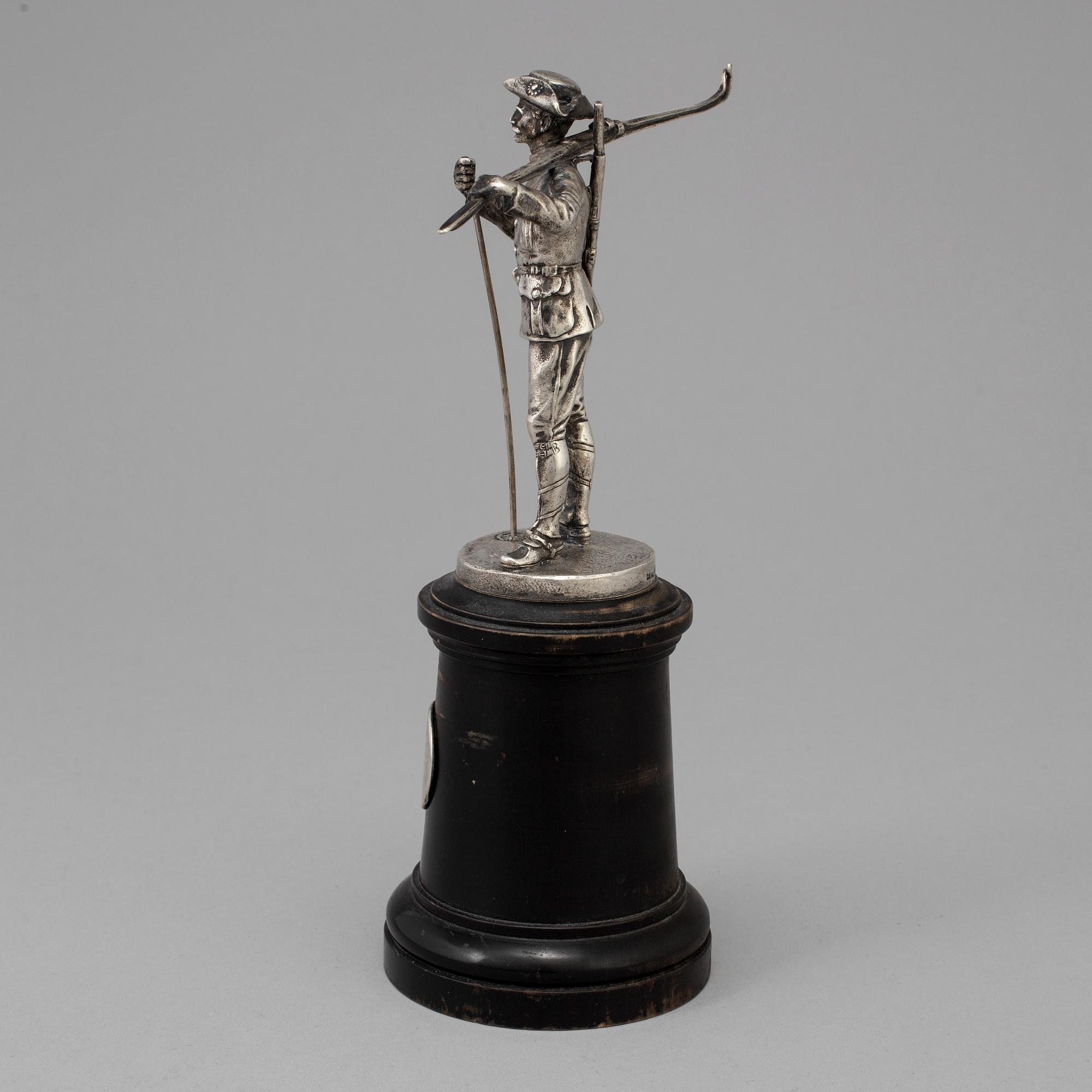 A Swedish silver figurine from CG Hallberg in Stockholm with unclear hallmarks.