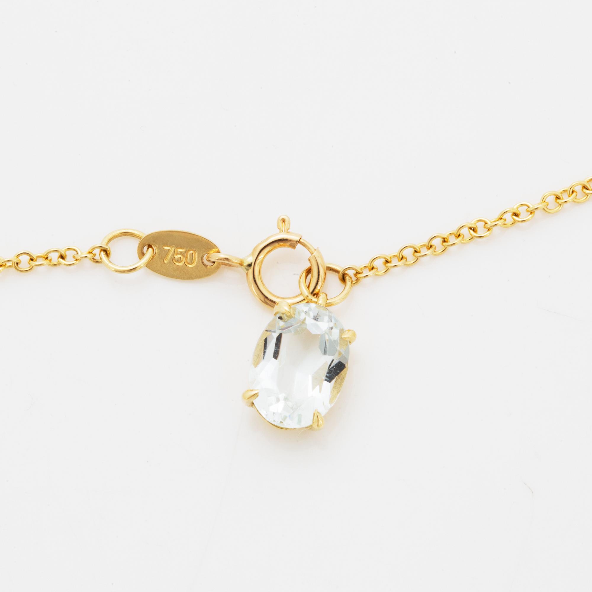 Collier, med runda fasettslipade akvamariner.