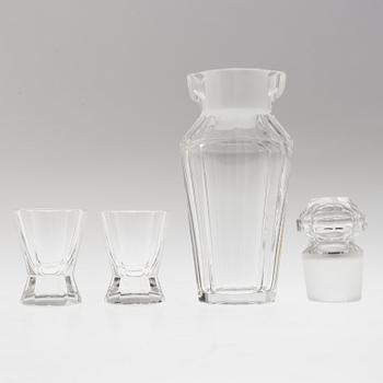 A set of twelve glasses and a cocktailshaker by Elis Berg, Kosta.