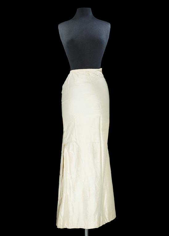 A white silk evening skirt by Christian Dior, spring 1952.