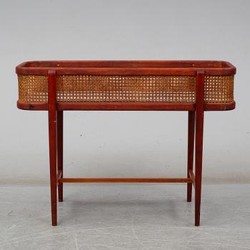 A late 20th century flower stand.