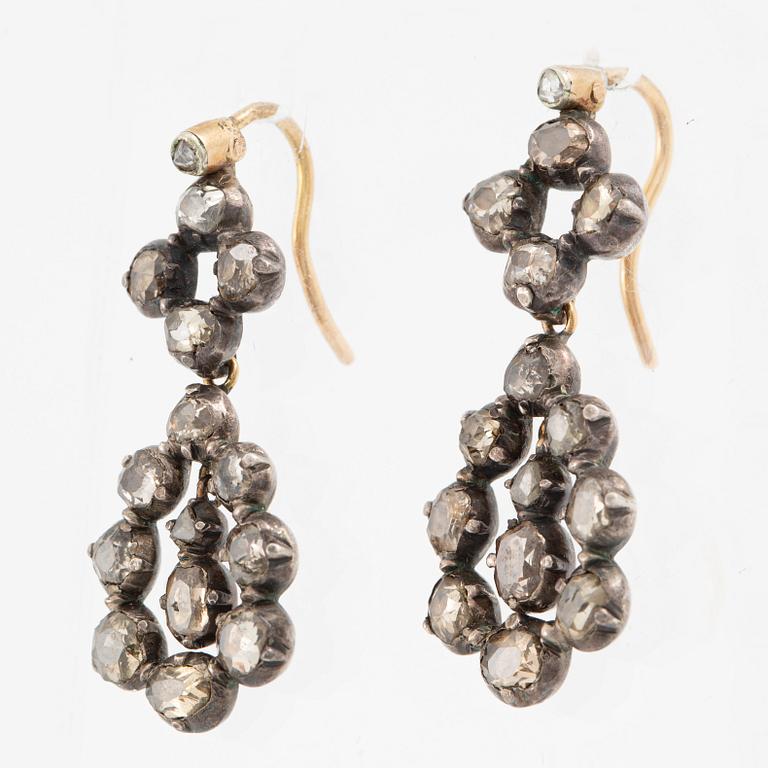 A pair of earrings in silver and 18K gold set with old-cut diamonds.