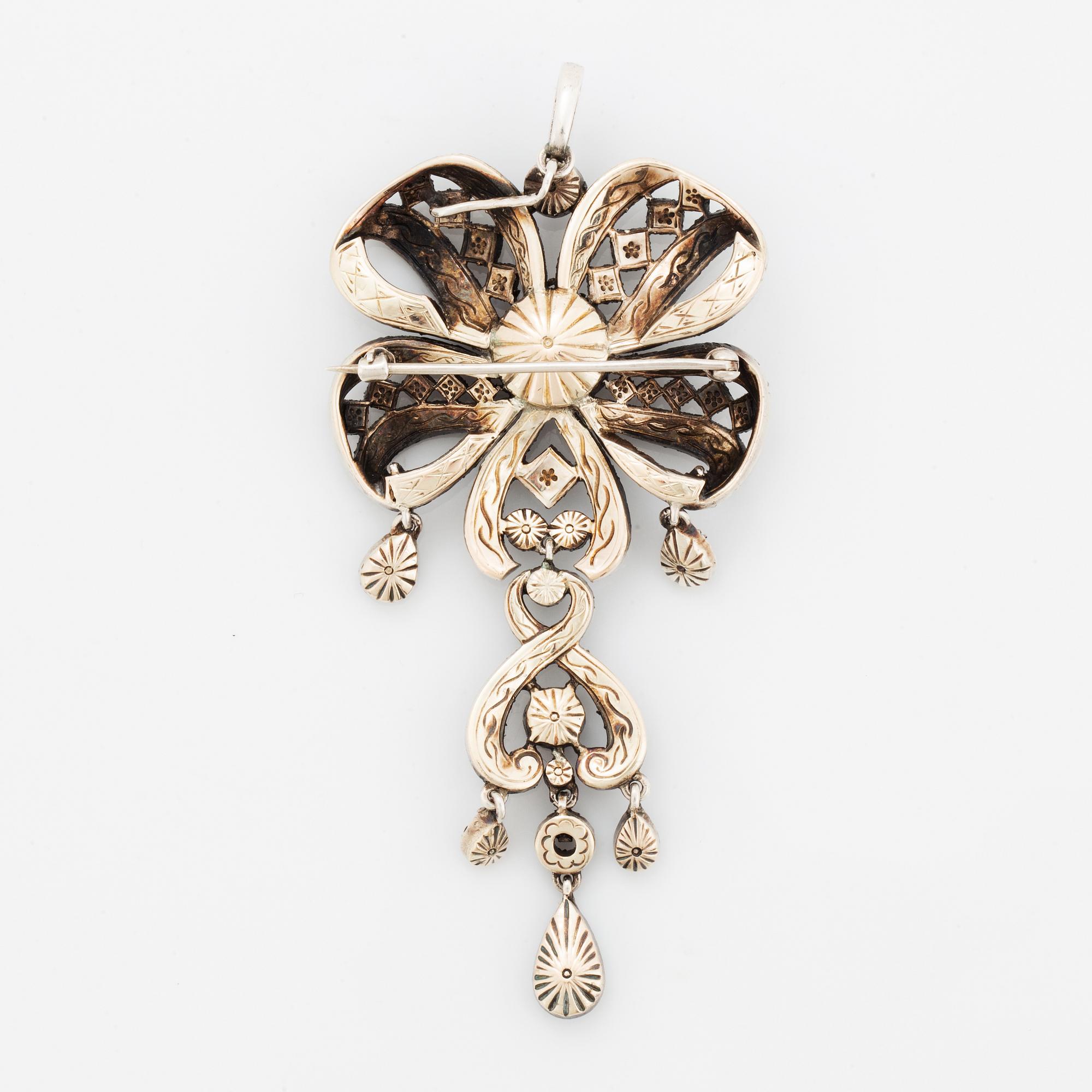 Brosch/hänge, silver och rosenslipade diamanter.