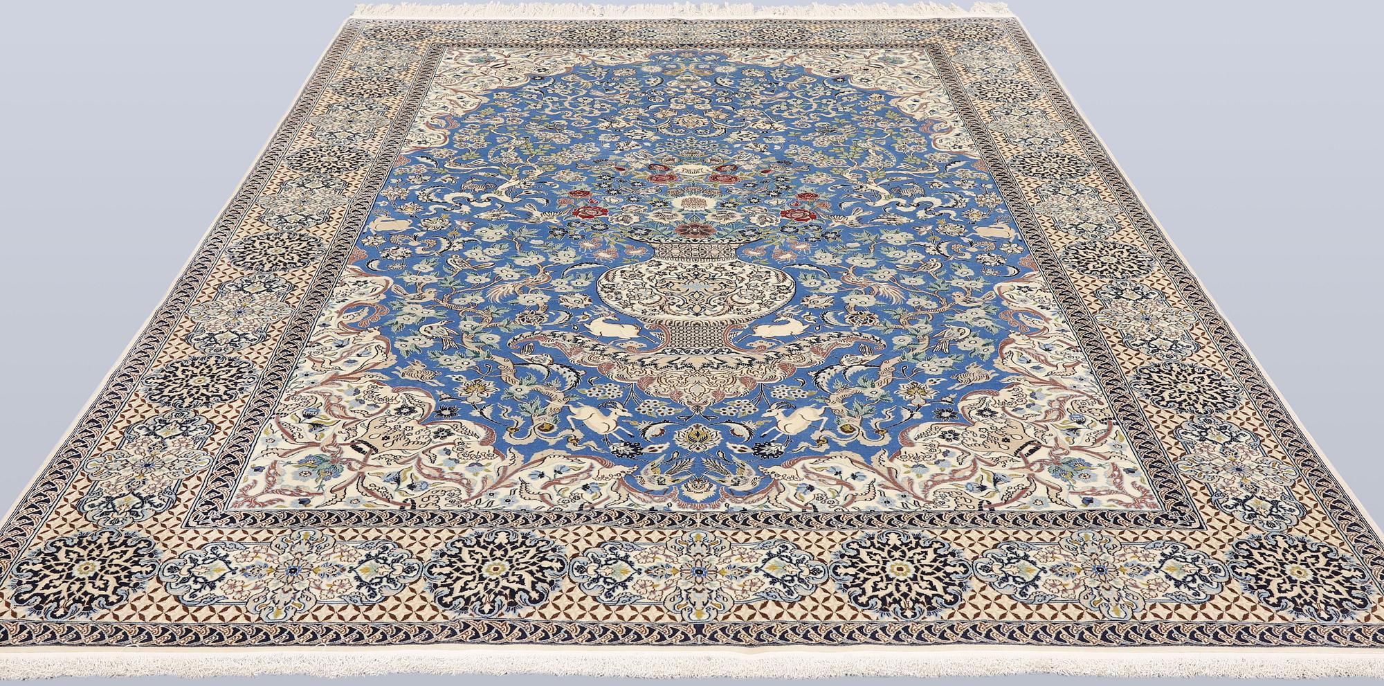 A Figural Nain-Isfahan carpet, part silk, 318 x 213 cm.