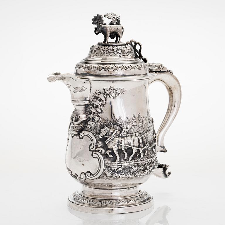 A George III sterling silver jug, maker's mark of John Deacon, London 1772.