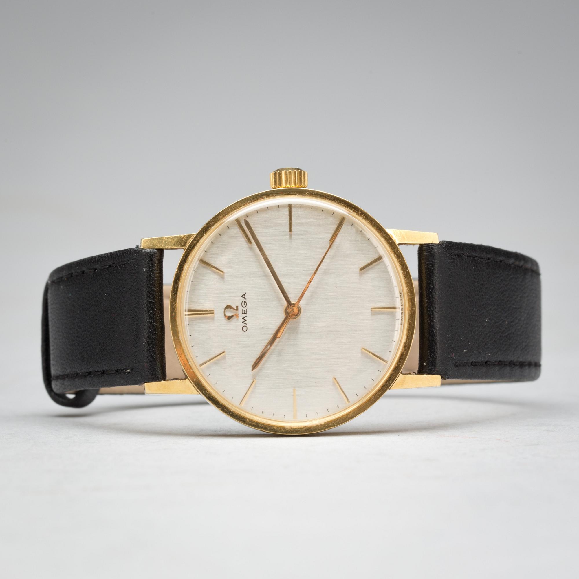 ARMBANDSUR, herr. Omega. 18K.
