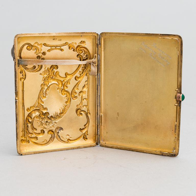 A Russian silver cigarette case, maker's mark of Mikhail Tarasov, Moscow 1908-14.