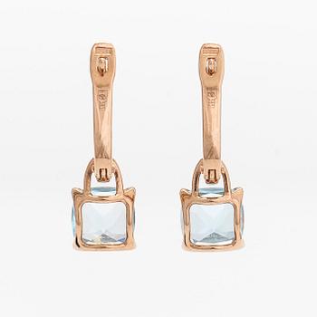 A pair of 14K rosegold earrings, with diamonds and topazes. Soviet Union.
