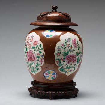 711. A famille rose and cappuciner brown jar, Qing dynasty, 18th Century.