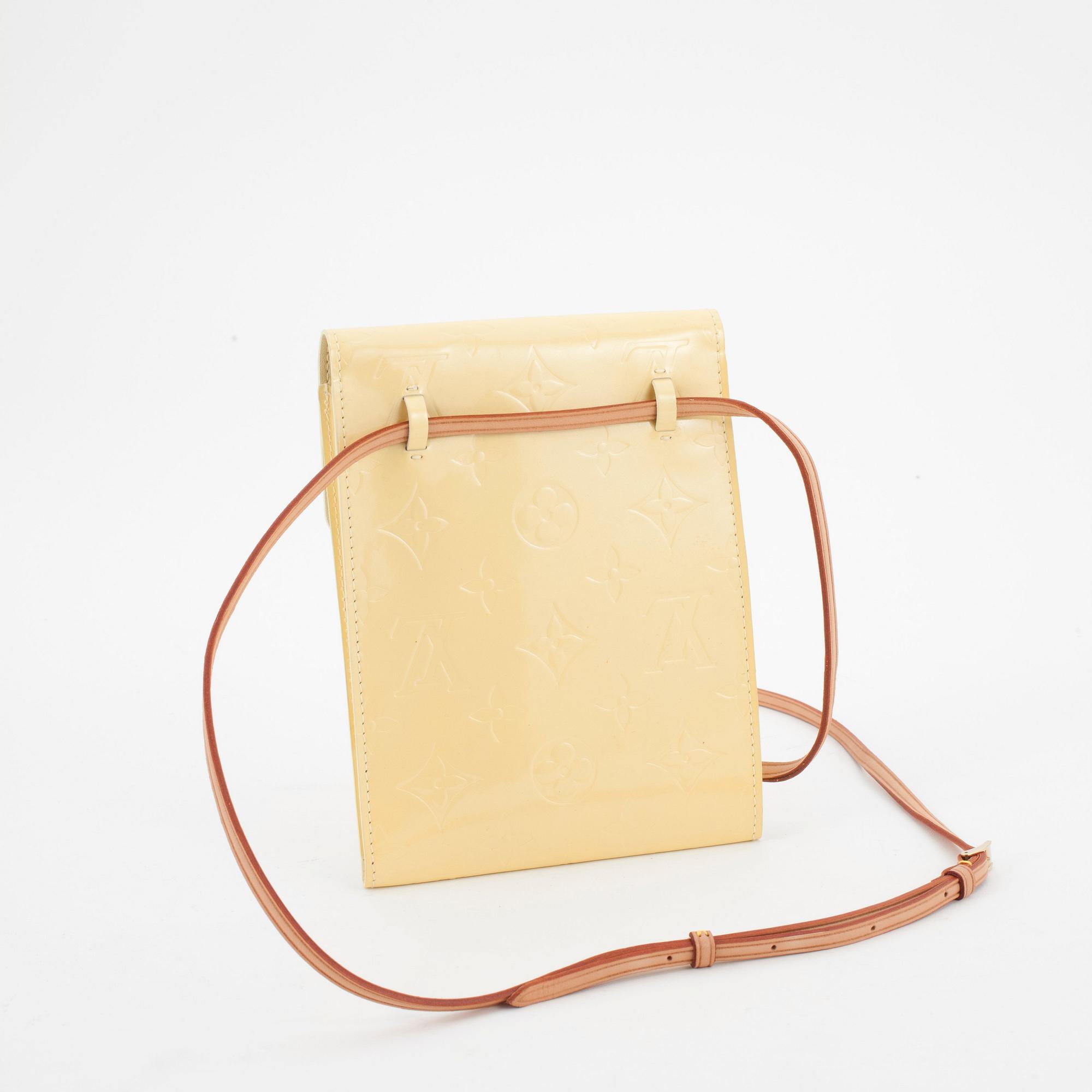 LOUIS VUITTON, a yellow vernis shoulder bag.