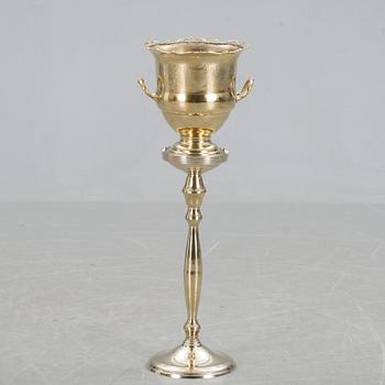 CHAMPAGNEKYLARE på FOT, metall, 1900-tal.