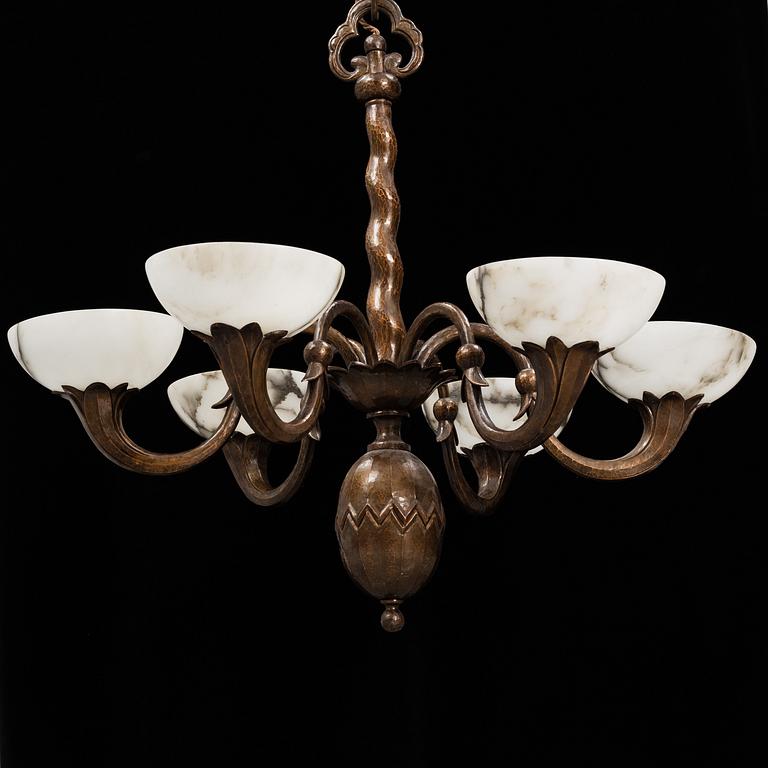 A 1920s-30s copper and alabaster ceiling light.