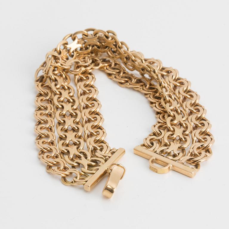 ARMBAND, x-länk samt bismarck, 18K guld.