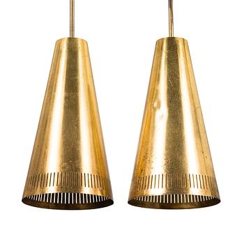 Paavo Tynell, a pair of 1953 pendant lights for Taito.