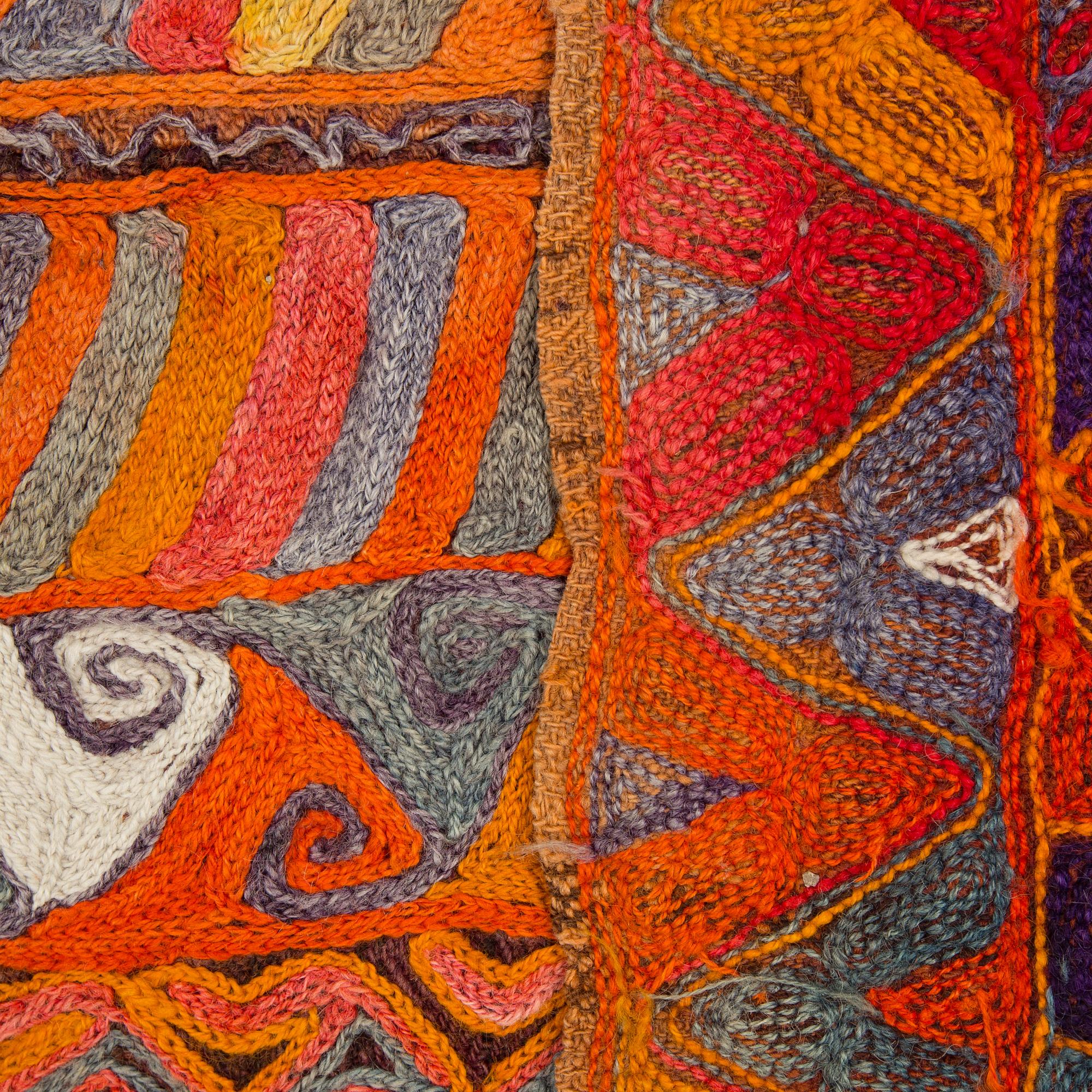 A semi-antique embroidered textile by the Marsh Arabs/nomads in Iraq, around 207 x 163 cm.