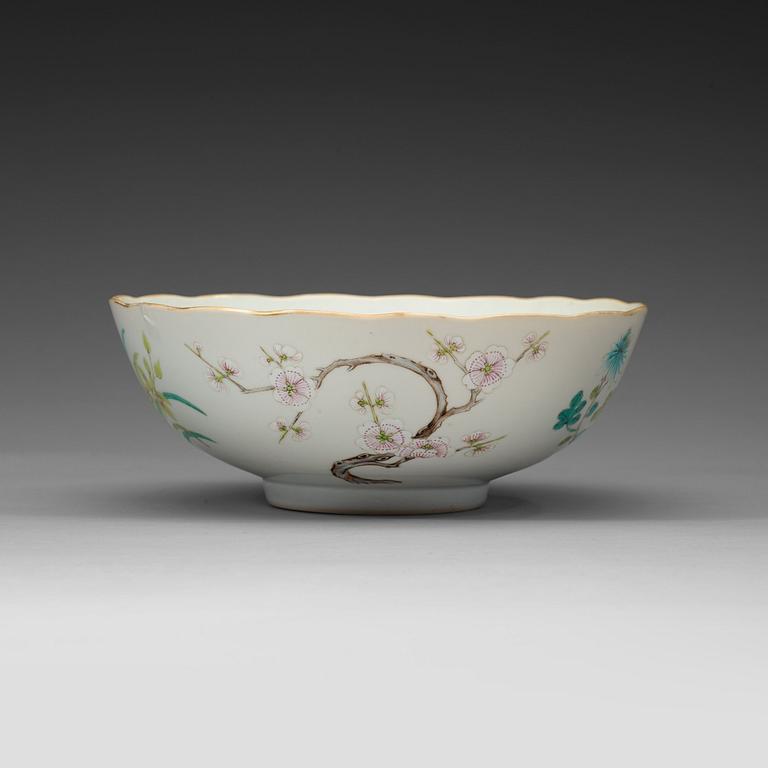 A famille rose bowl, late Qing dynasty, with Daoguangs sealmark in red.