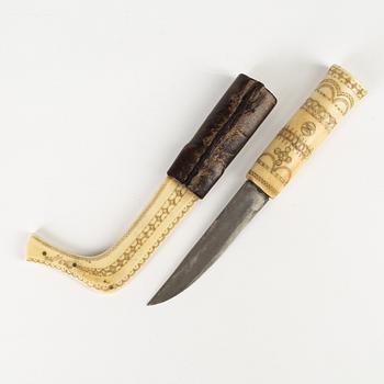 A reindeer horn knife dated 1916.