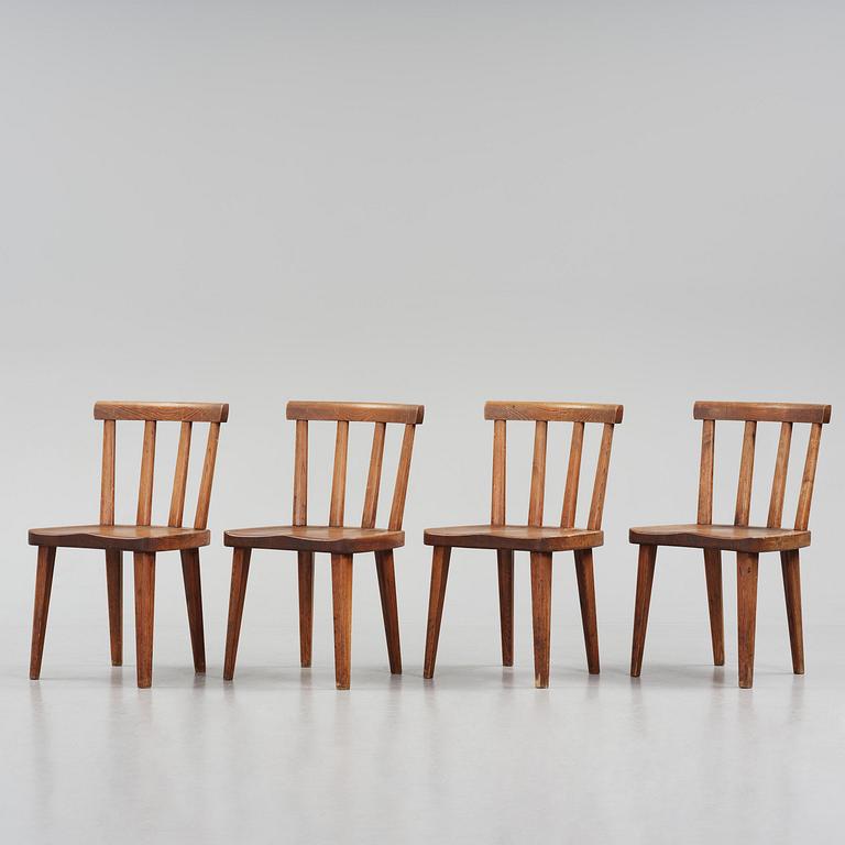 Axel Einar Hjorth, a set of four stained pine "Utö" chairs, Nordiska Kompaniet, Sweden, 1930s.