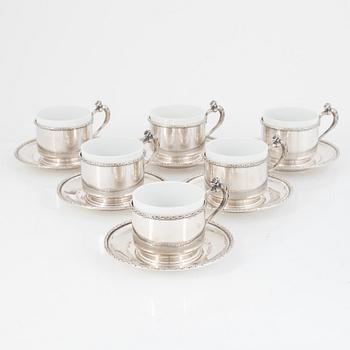 Silver tea mug holders with saucers, Pest, Austria, around 1900.