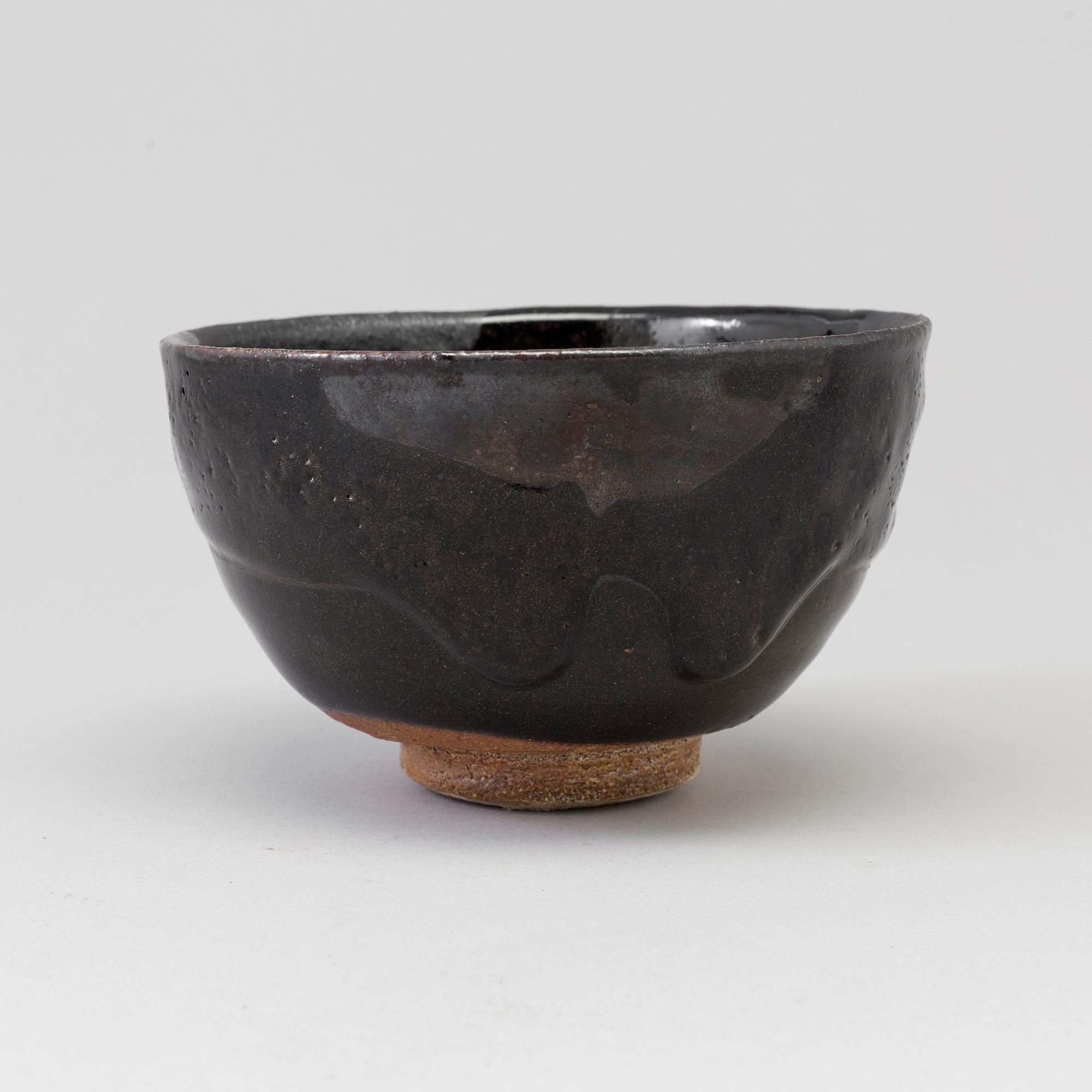 A Japanese Raku stoneware bowl, 20th century.