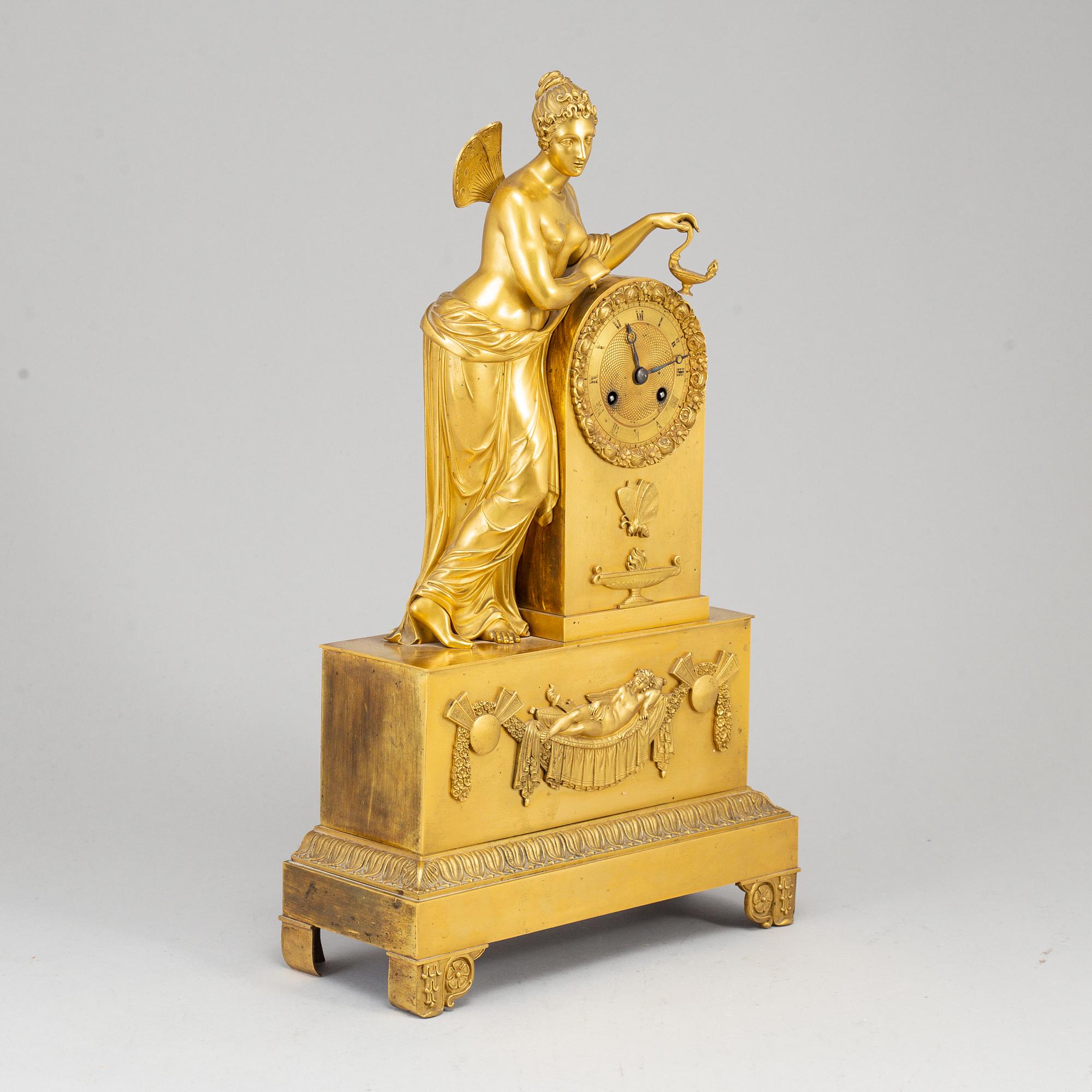 A French Empire mantel clock, beginning of the 19th ct.