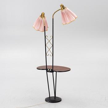 A floor lamp with table, 1940s.